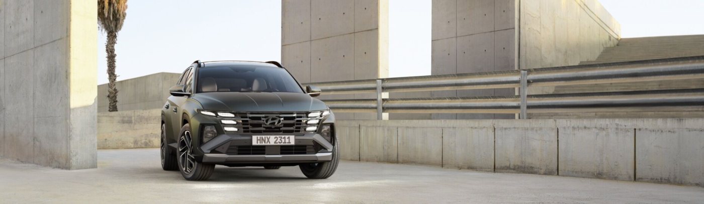 Closer view at the front part of Hyundai car with its logo and grille